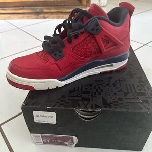 Nike Air Jordan 4 Retro 
Red and Blue Sneakers